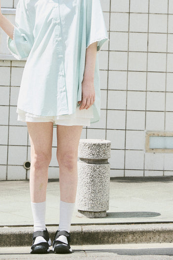 EUNJO Icing oversized icing shirt Sky in light blue with a relaxed fit, casual long-sleeve design, and subtle icing-themed print.