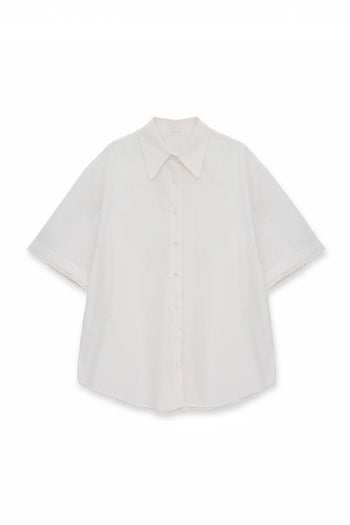 EUNJO oversized Icing shirt with bold Icing design, relaxed fit, soft fabric, displayed on a hanger against a plain background.