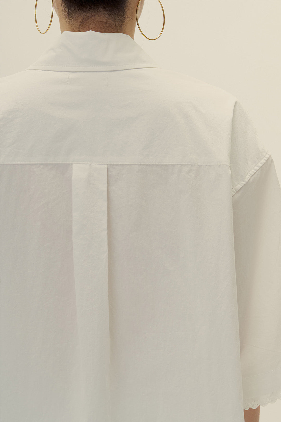 EUNJO oversized icing shirt featuring a bold icing graphic design on the front, casual fit, and soft fabric.
