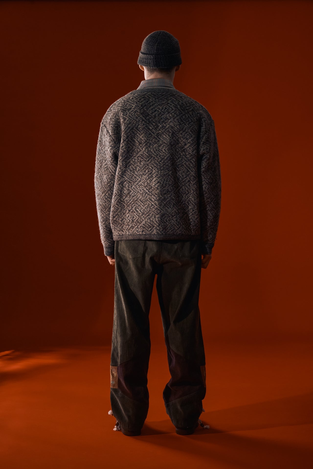 Brown IOEDLE flowing landscape short beanie with a relaxed fit, featuring a soft knit fabric and casual style.