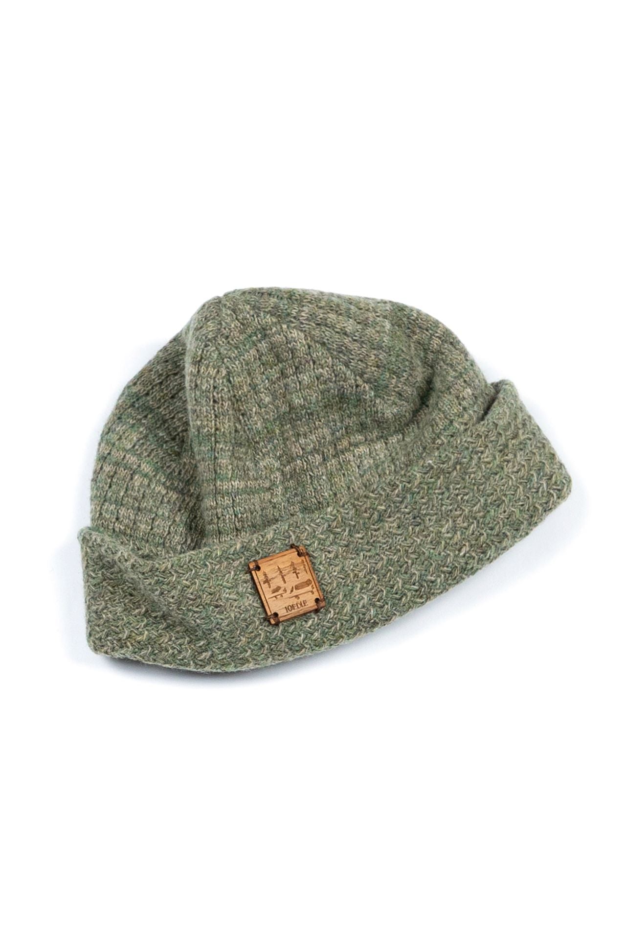 Green IOEDLE flowing landscape short beanie, soft knit fabric, designed for a snug fit and stylish casual wear.