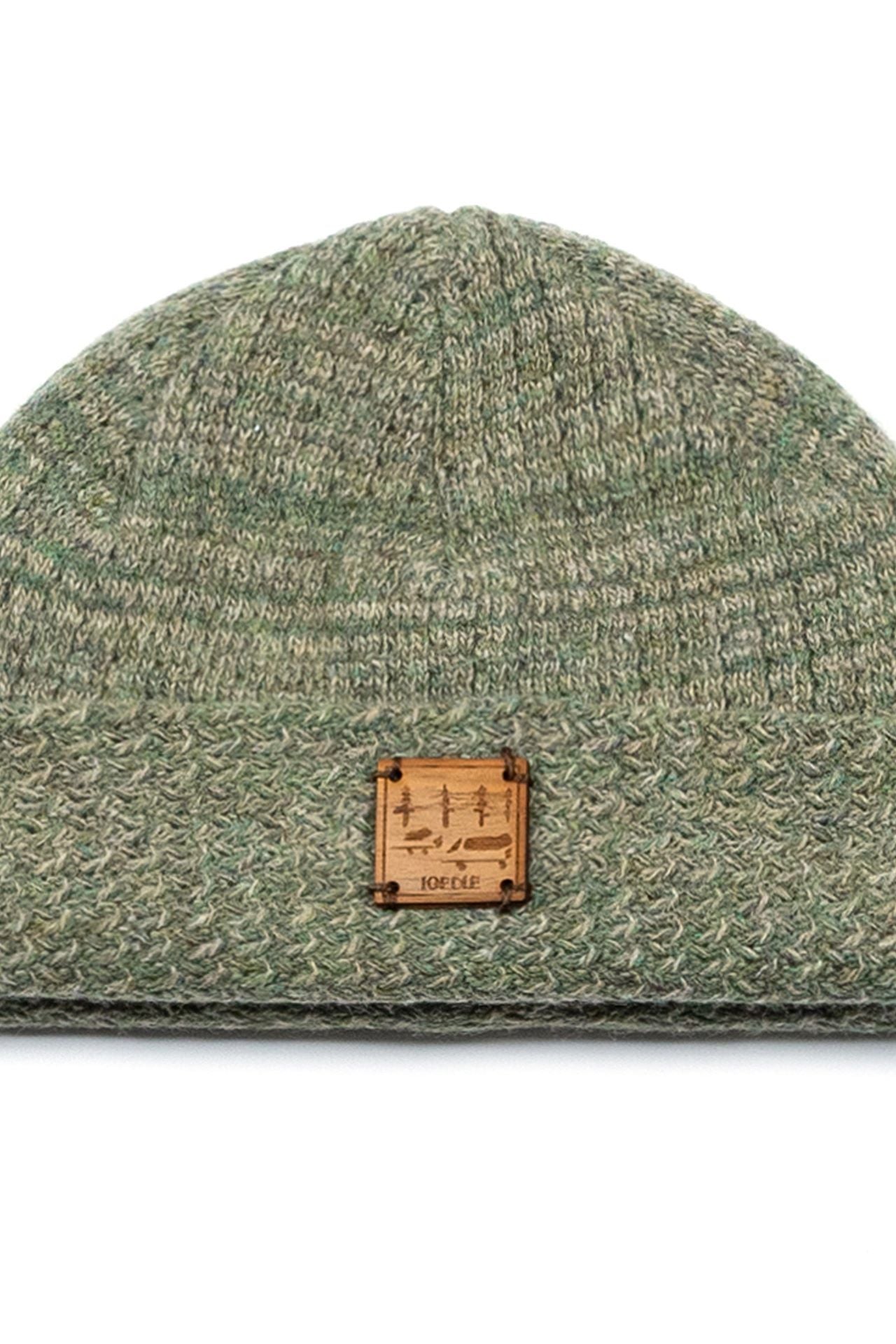Green IOEDLE flowing landscape short beanie, cozy knit cap with a vibrant landscape pattern, one-size fits most.