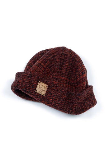 Red and brown flowing landscape pattern beanie by IOEDLE, made of soft fabric, in a short, snug fit.