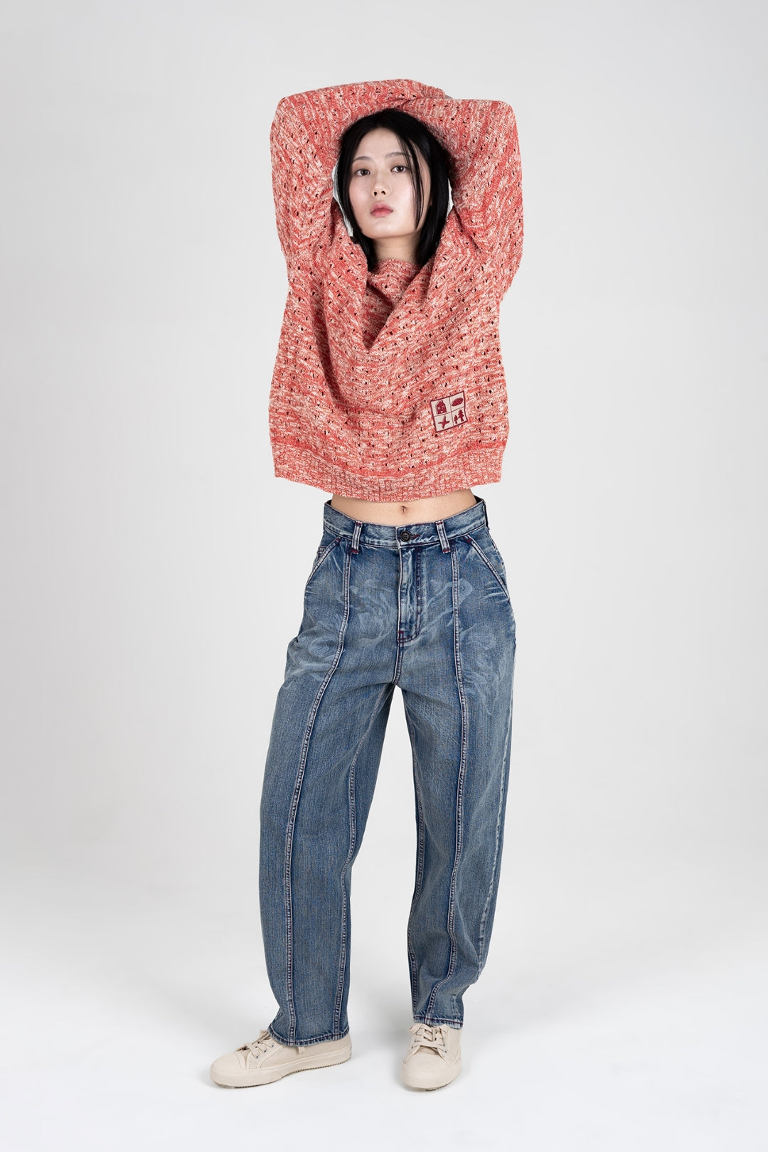 Blue Koi Lake denim pants by IOEDLE, stylish bottoms with a relaxed fit, displayed on a neutral background.