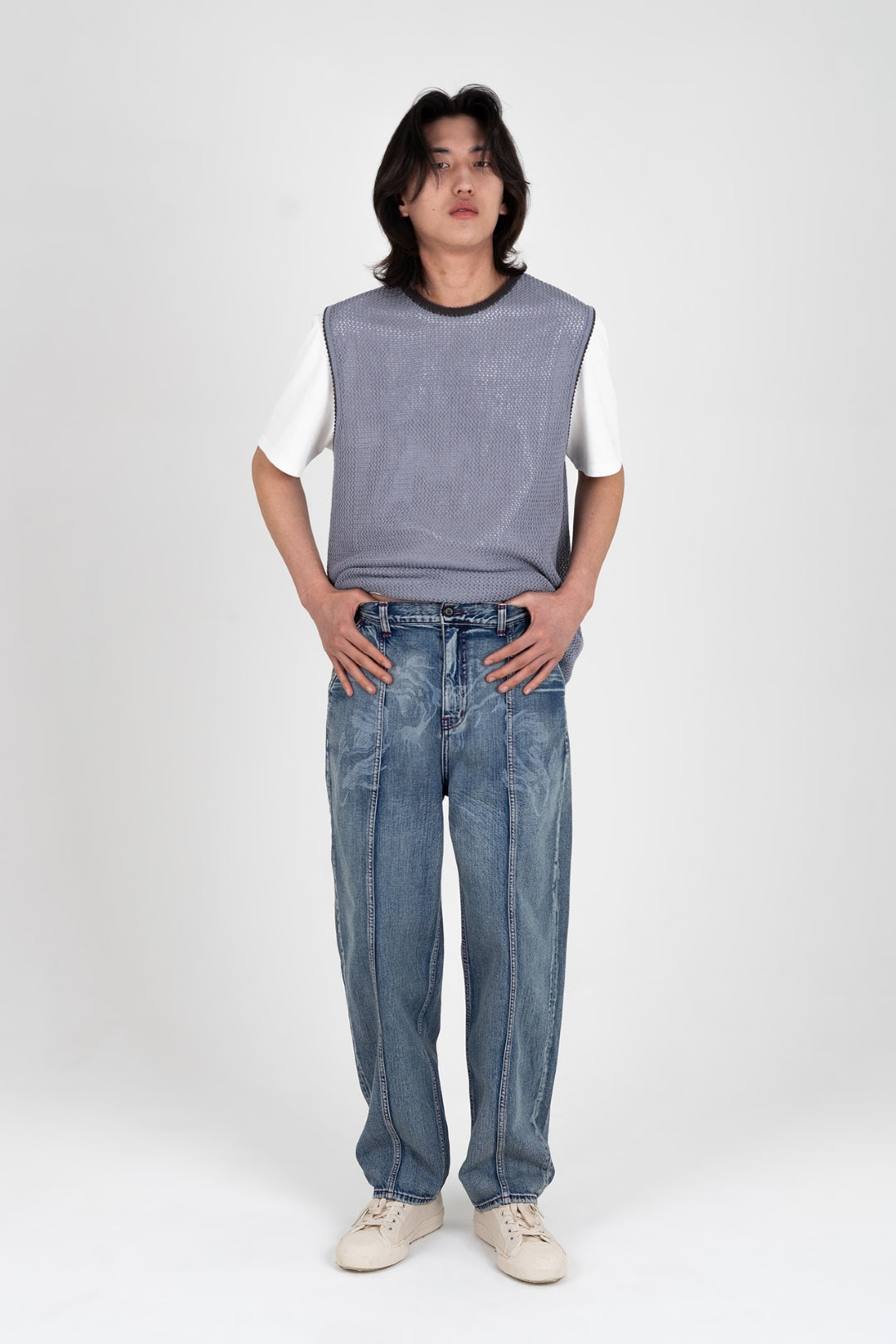 IOEDLE Koi Lake Denim Pants, stylish blue jeans for women, featuring classic denim texture and a relaxed fit.