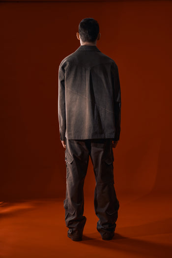 Brown Dirt Cargo Pants by IOEDLE, styled as casual cargo pants, with multiple pockets and a rugged fabric design.
