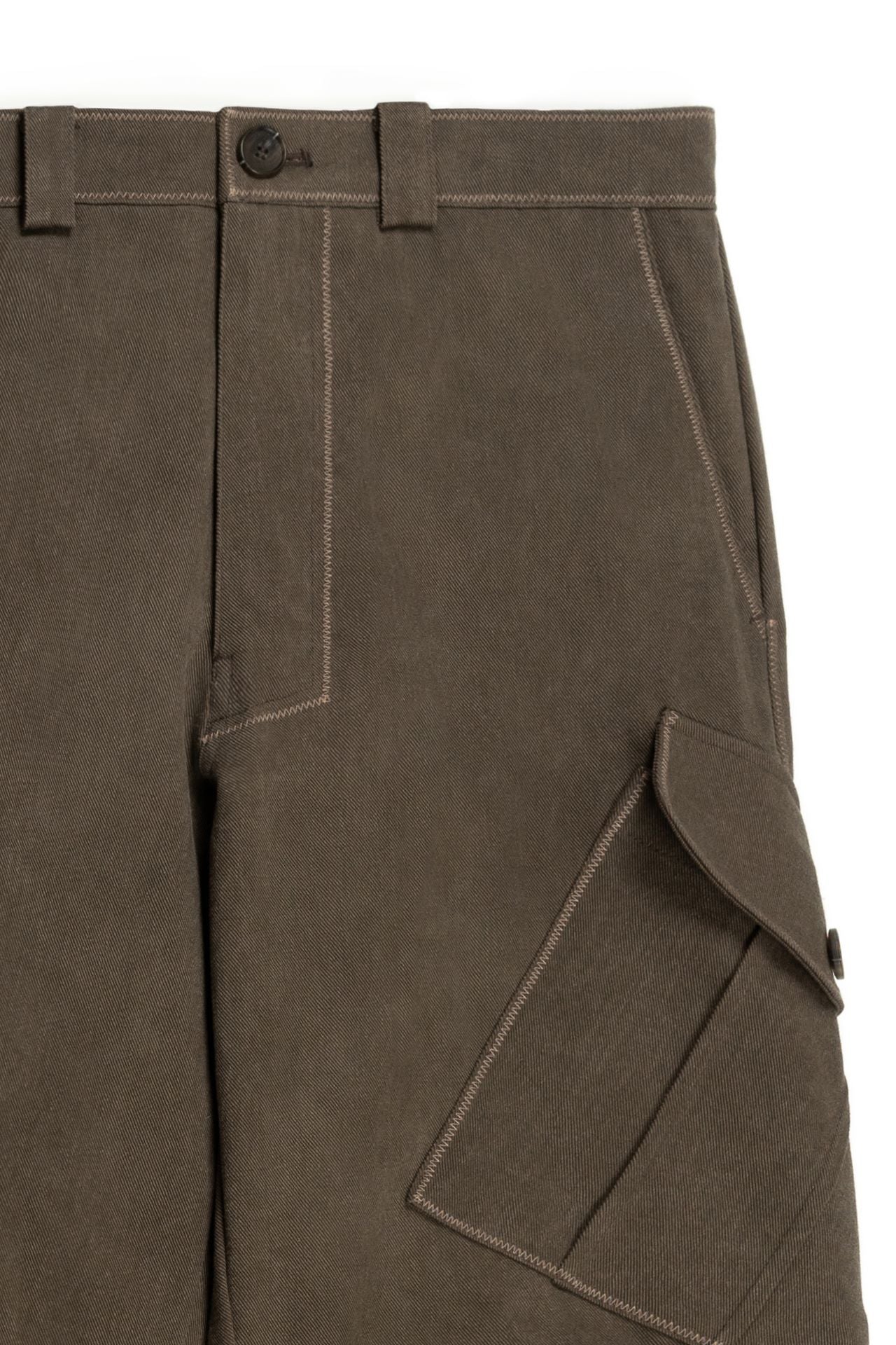 Brown Dirt Cargo Pants by IOEDLE, displayed with a rugged design suitable for outdoor and casual wear.