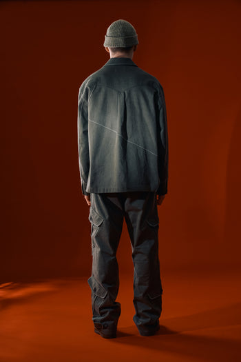 Green Dirt Cargo Pants by IOEDLE, showcasing rugged, durable cargo style with multiple pockets and a comfortable fit.