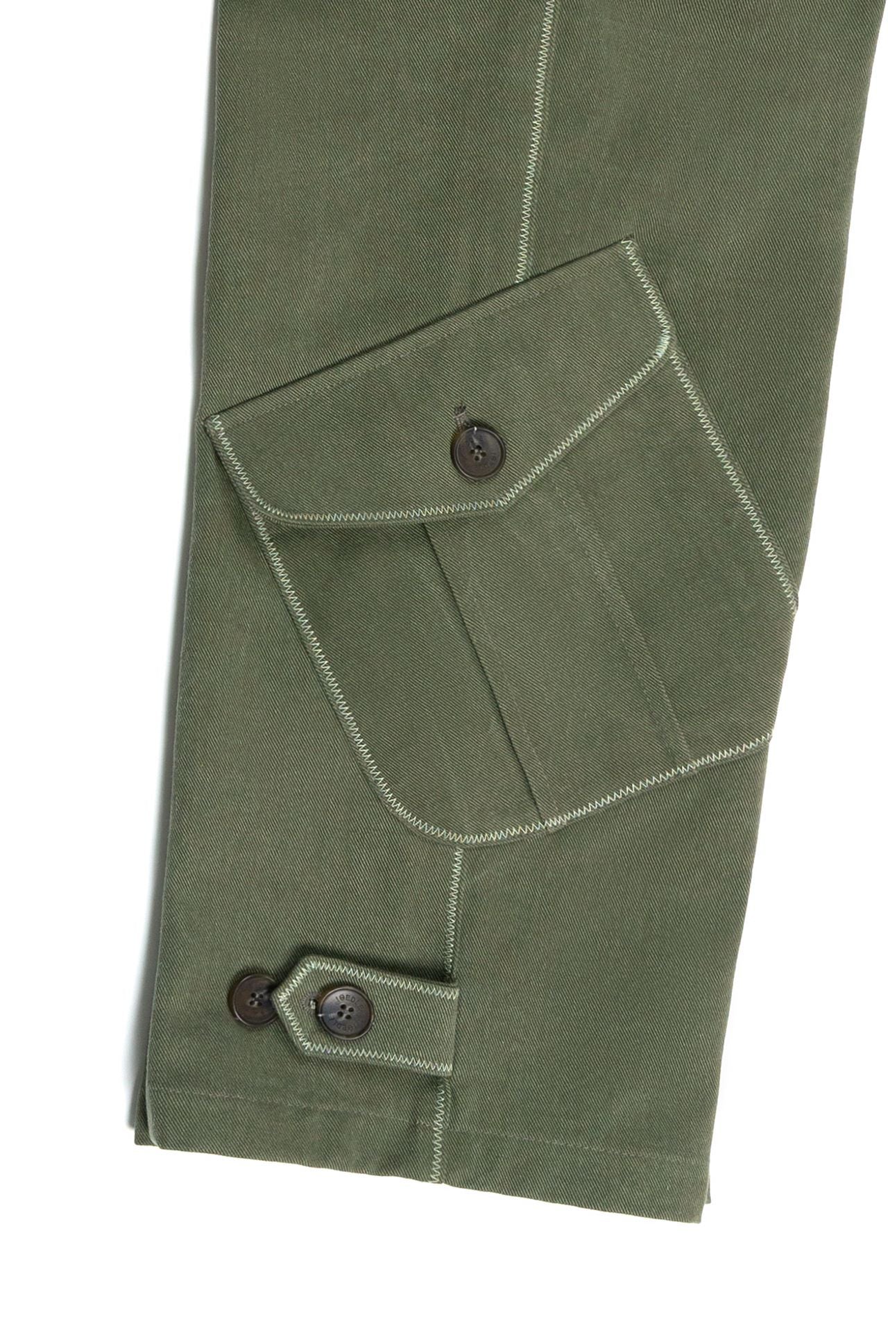 Green Dirt Cargo Pants from IOEDLE, casual cargo style with multiple pockets and rugged fabric, designed for outdoor wear.
