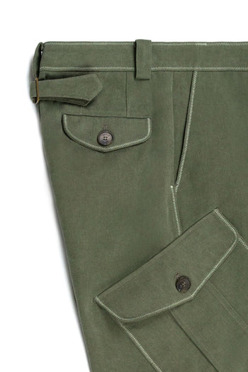 Green dirt cargo pants from IOEDLE, styled as a jacket with multiple pockets and durable fabric, suitable for outdoor wear.