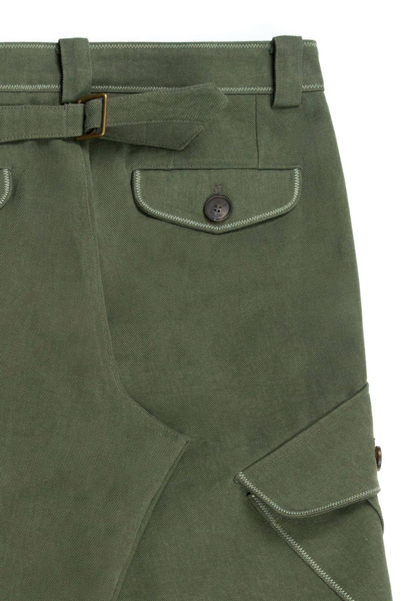 Green IOEDLE Dirt Cargo Pants styled as casual cargo pants, showcasing durable fabric and multiple side pockets.
