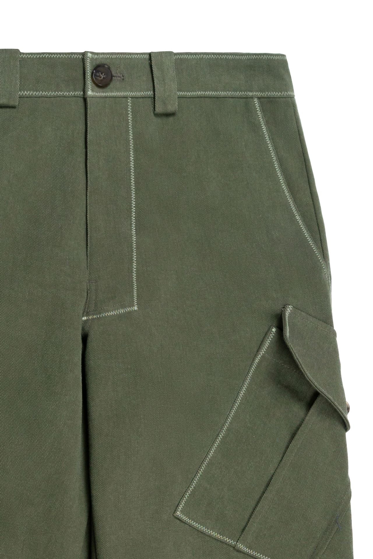 Green Dirt Cargo Pants from IOEDLE featuring multiple pockets and rugged cargo style for outdoor wear