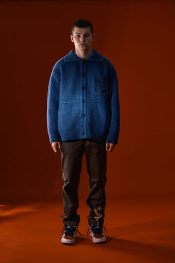 Blue IOEDLE Guide to Memories Knit Jacket featuring a cozy knit design and stylish fit for casual wear.