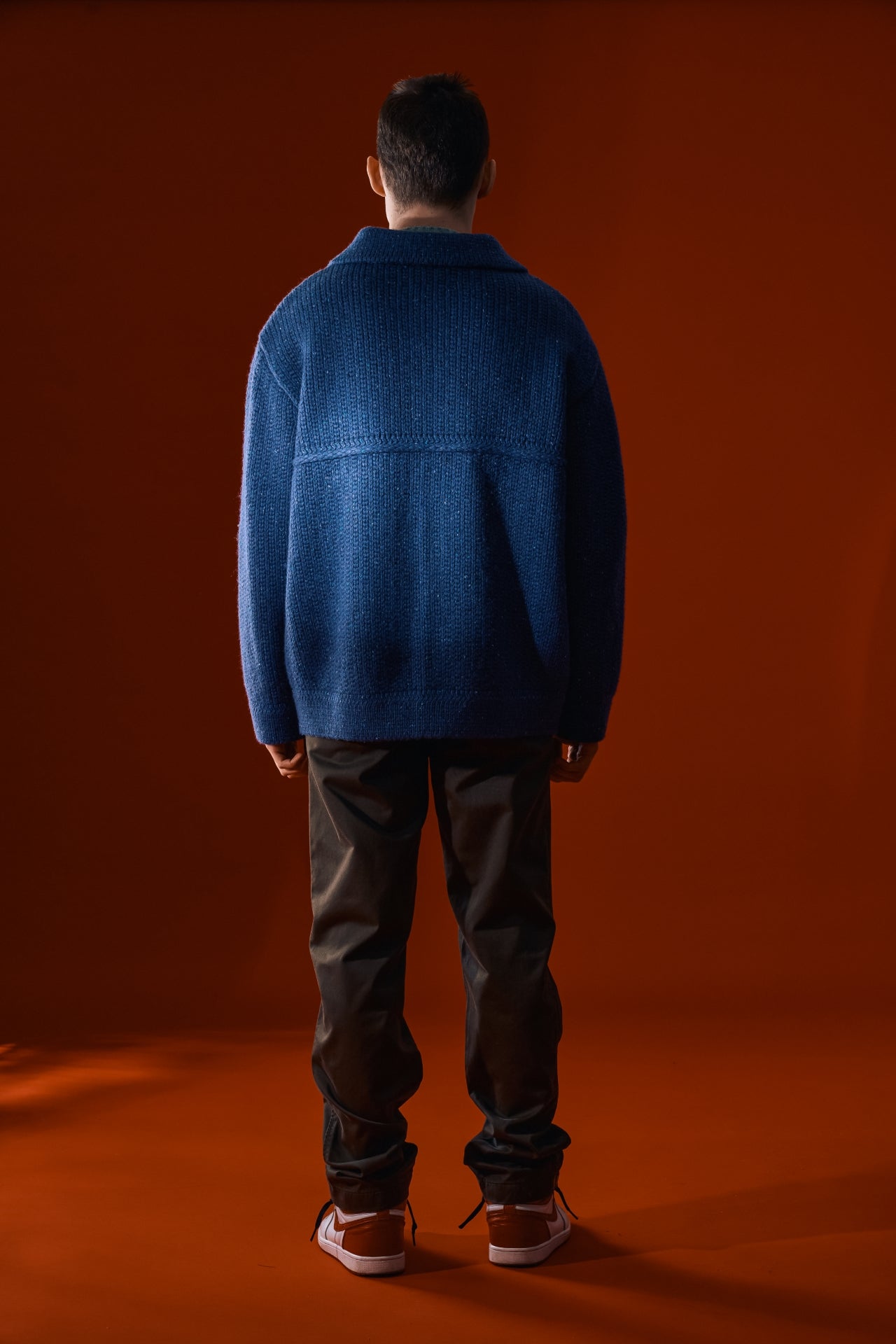 Blue IOEDLE Guide to Memories Knit Jacket, showcasing a cozy, stylish jacket with a textured knit design and button details.