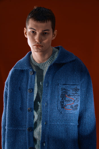 Blue Guide to Memories Knit Jacket by IOEDLE, featuring a cozy, stylish knit design with a comfortable fit and textured fabric.