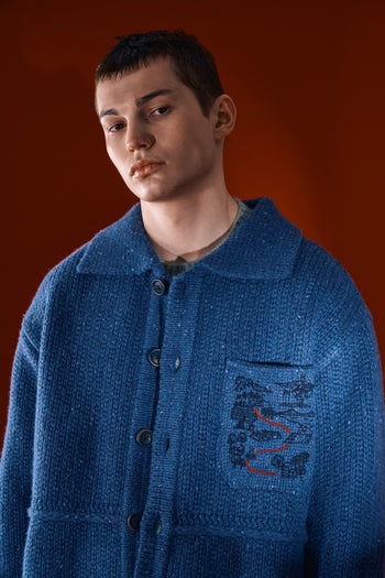 Blue IOEDLE Guide to Memories Knit Jacket with textured knit design, shown on a mannequin.
