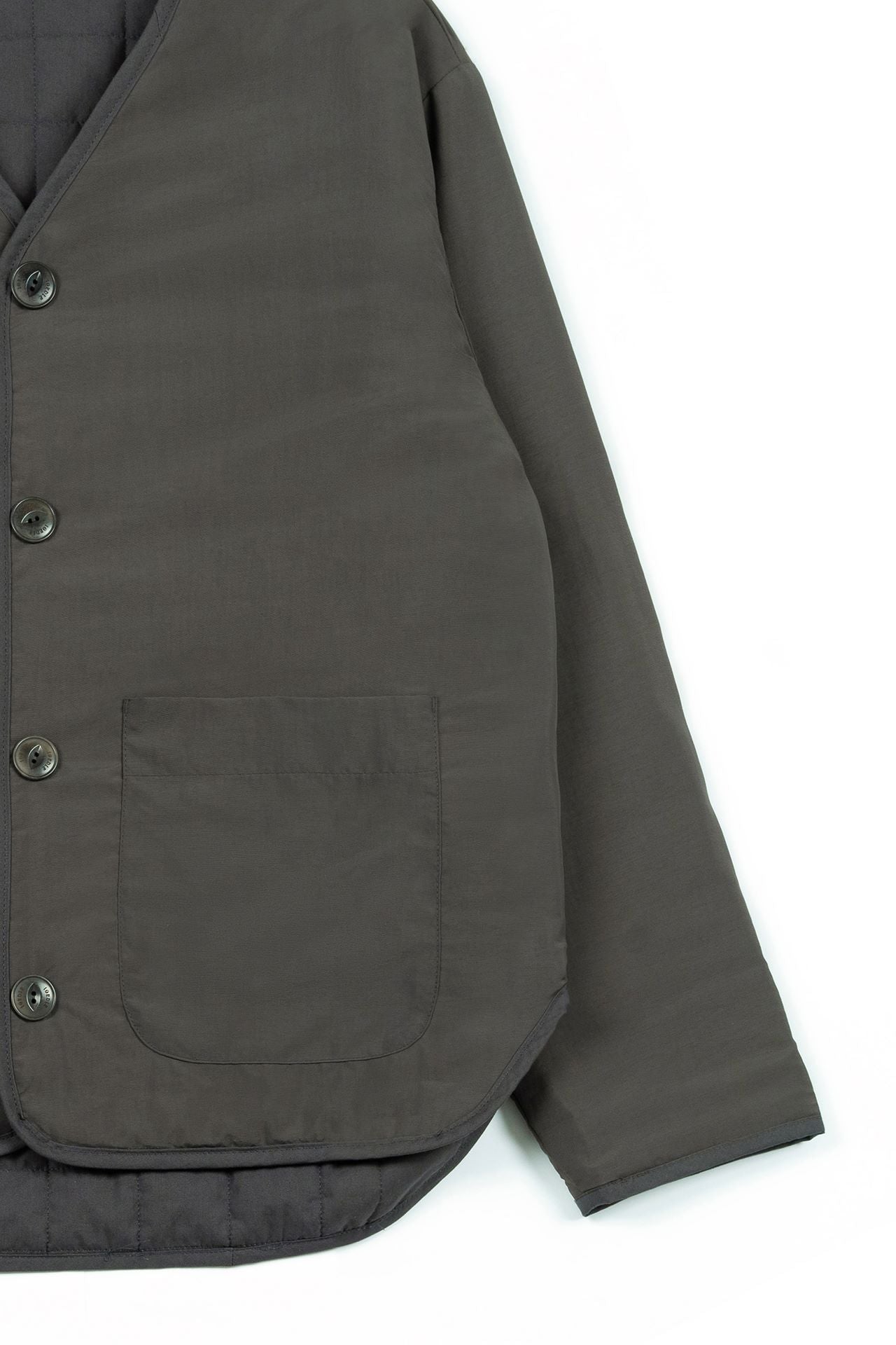 IOEDLE Welcoming Gate Quilted Jacket in charcoal, showcasing the stylish, padded design and cozy fit perfect for cold weather.