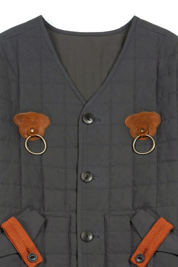 IOEDLE Welcoming Gate Quilted Jacket in charcoal, showing the cozy, padded design and stylish collar detail.