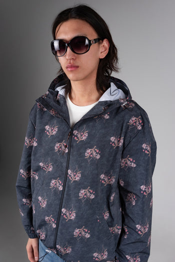 Dark grey IOEDLE flower graphic windbreaker jacket, lightweight windbreaker with floral design on the front.