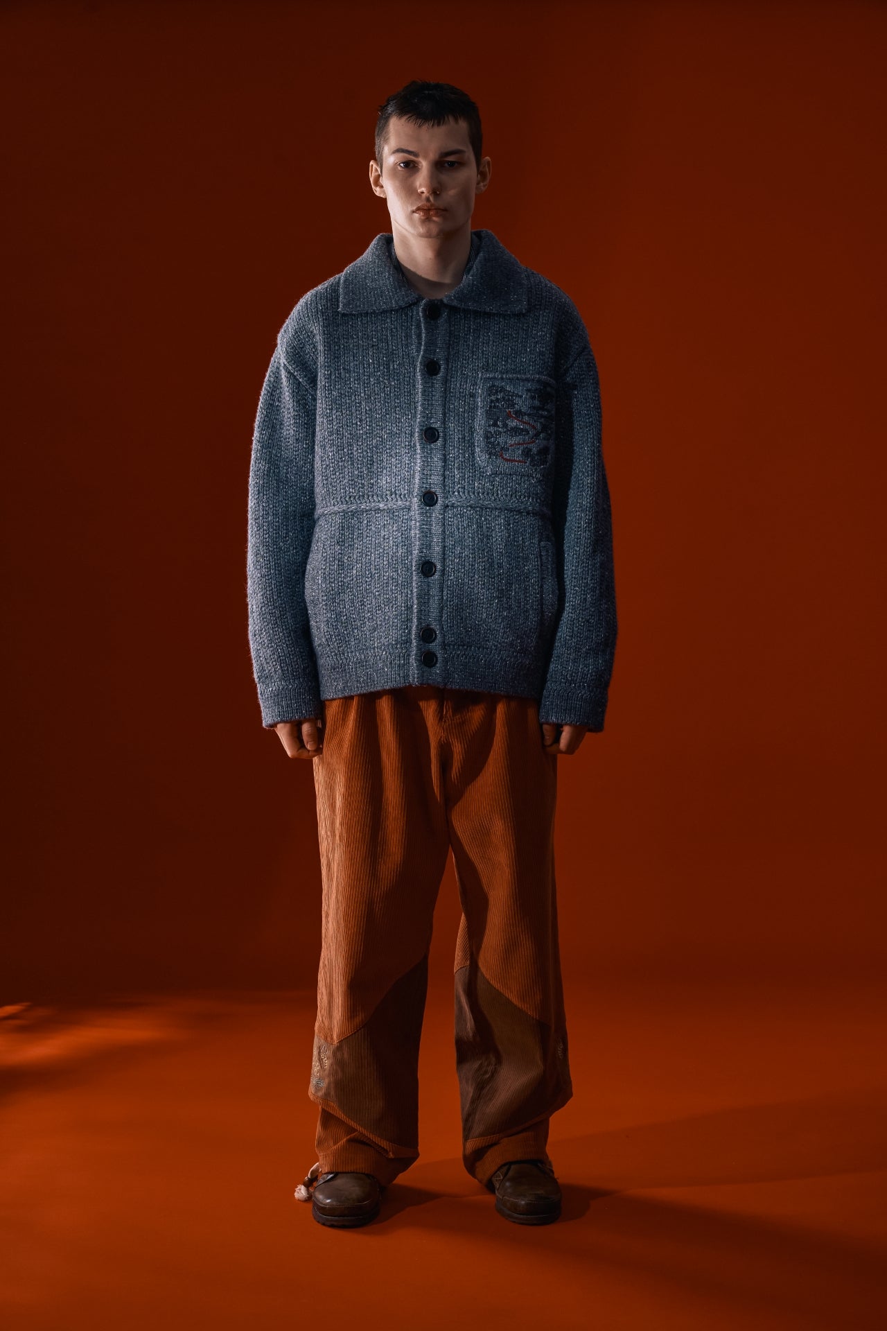 Grey Guide to Memories Knit Jacket by IOEDLE, showing a cozy, stylish knit jacket with a textured pattern.