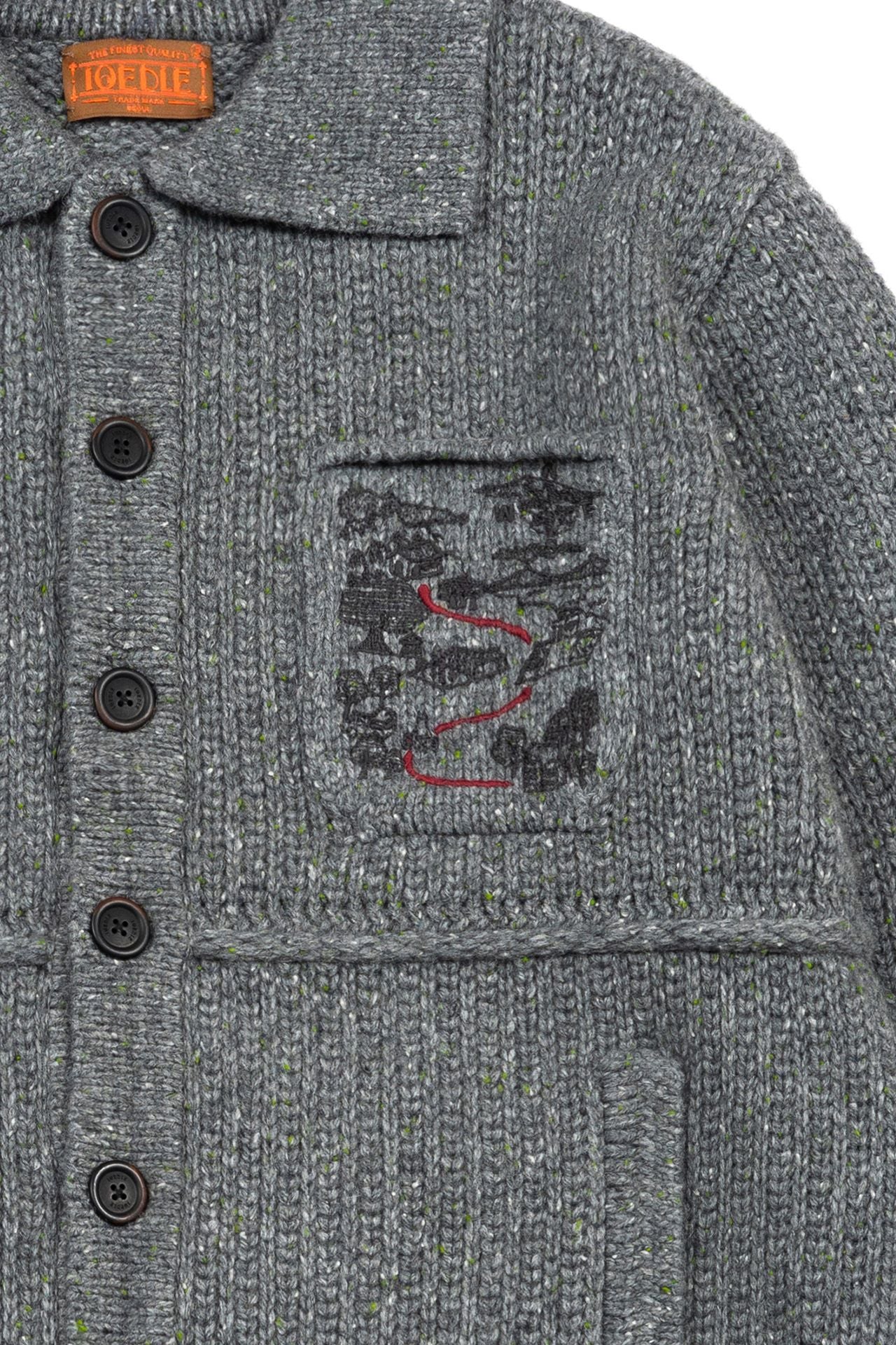 IOEDLE Guide to Memories Knit Jacket in grey, showcasing the cozy, textured knit design and stylish fit of this casual jacket.