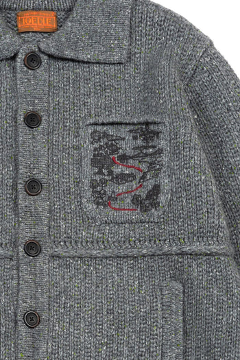 IOEDLE Guide to Memories Knit Jacket in grey, showcasing the cozy, textured knit design and stylish fit of this casual jacket.