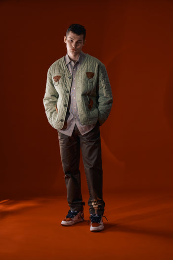 Olive green IOEDLE Welcoming Gate Quilted Jacket for women, featuring a cozy, insulated design with a quilted pattern.