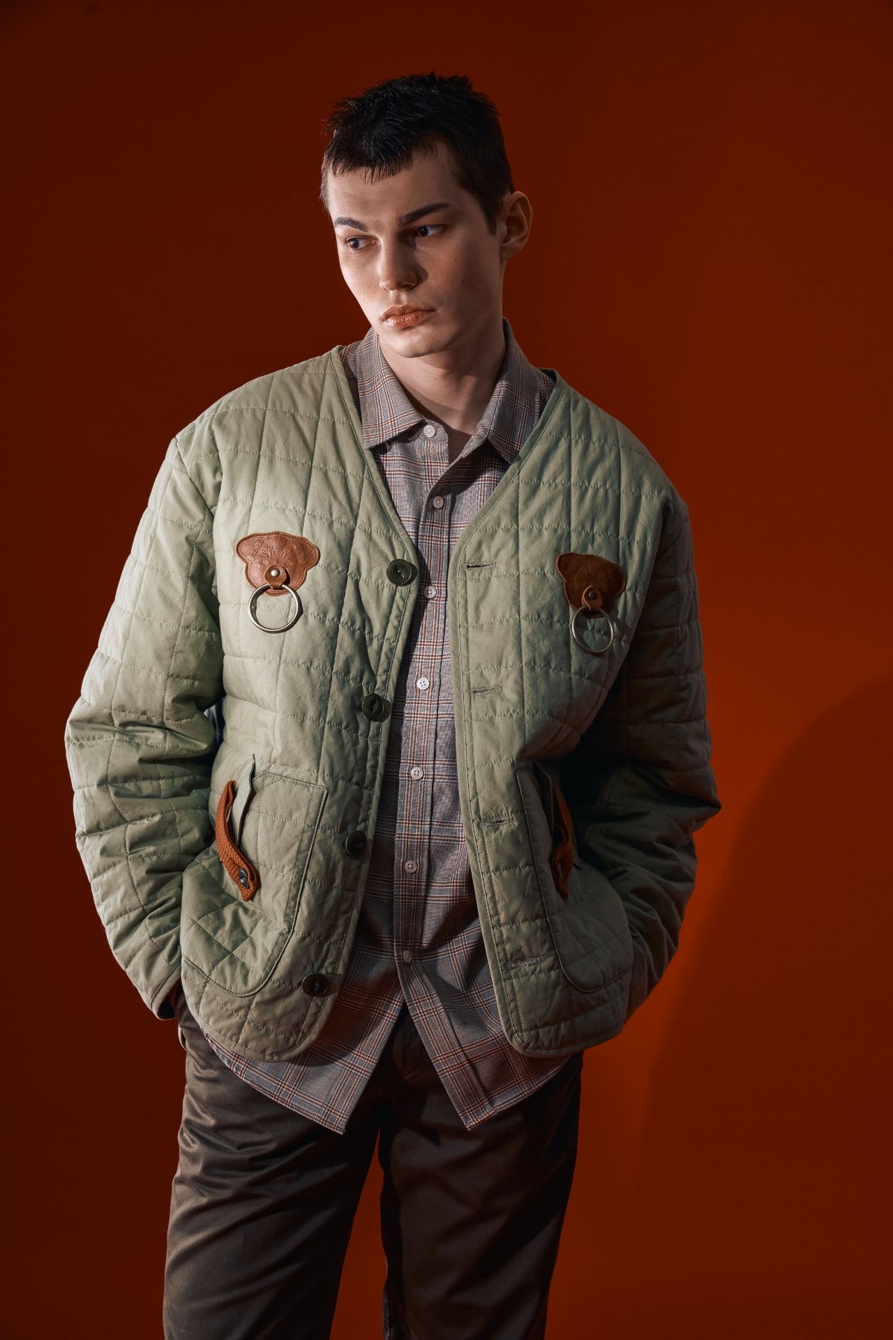IOEDLE Welcoming Gate Quilted Jacket in olive color, showcasing the padded, stylish jacket with a quilted design and front zipper.