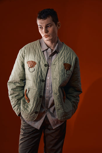 IOEDLE Welcoming Gate Quilted Jacket in olive color, showcasing the padded, stylish jacket with a quilted design and front zipper.