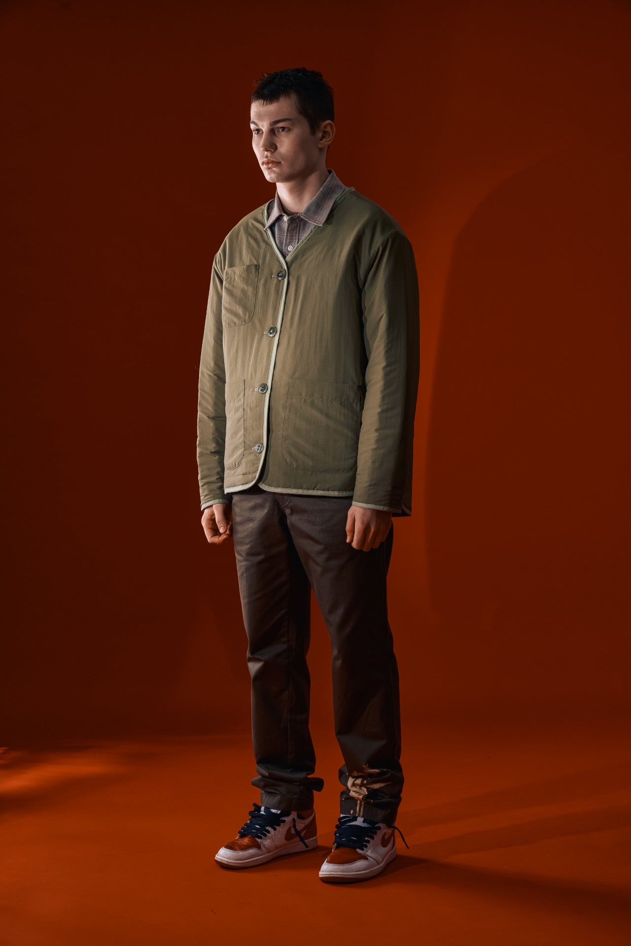 Olive green Welcoming Gate Quilted Jacket by IOEDLE, featuring a cozy, quilted design and front zipper for casual winter wear.