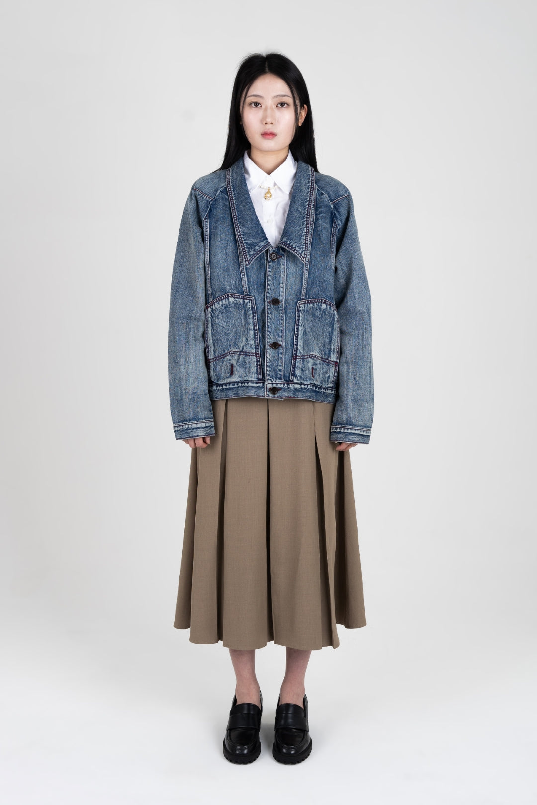 IOEDLE upside down denim jacket, stylish casual jacket with unique design, front view showing distressed denim and button details.