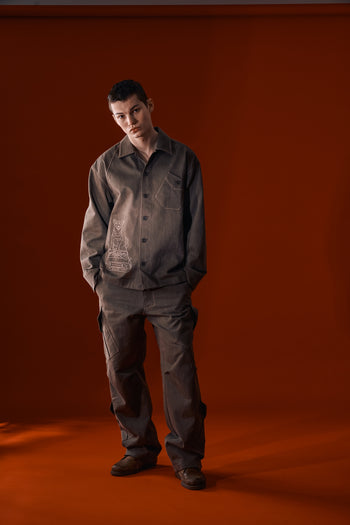 Brown diagonal landscape shirt from IOEDLE featuring a stylish, geometric pattern on a casual shirt design.
