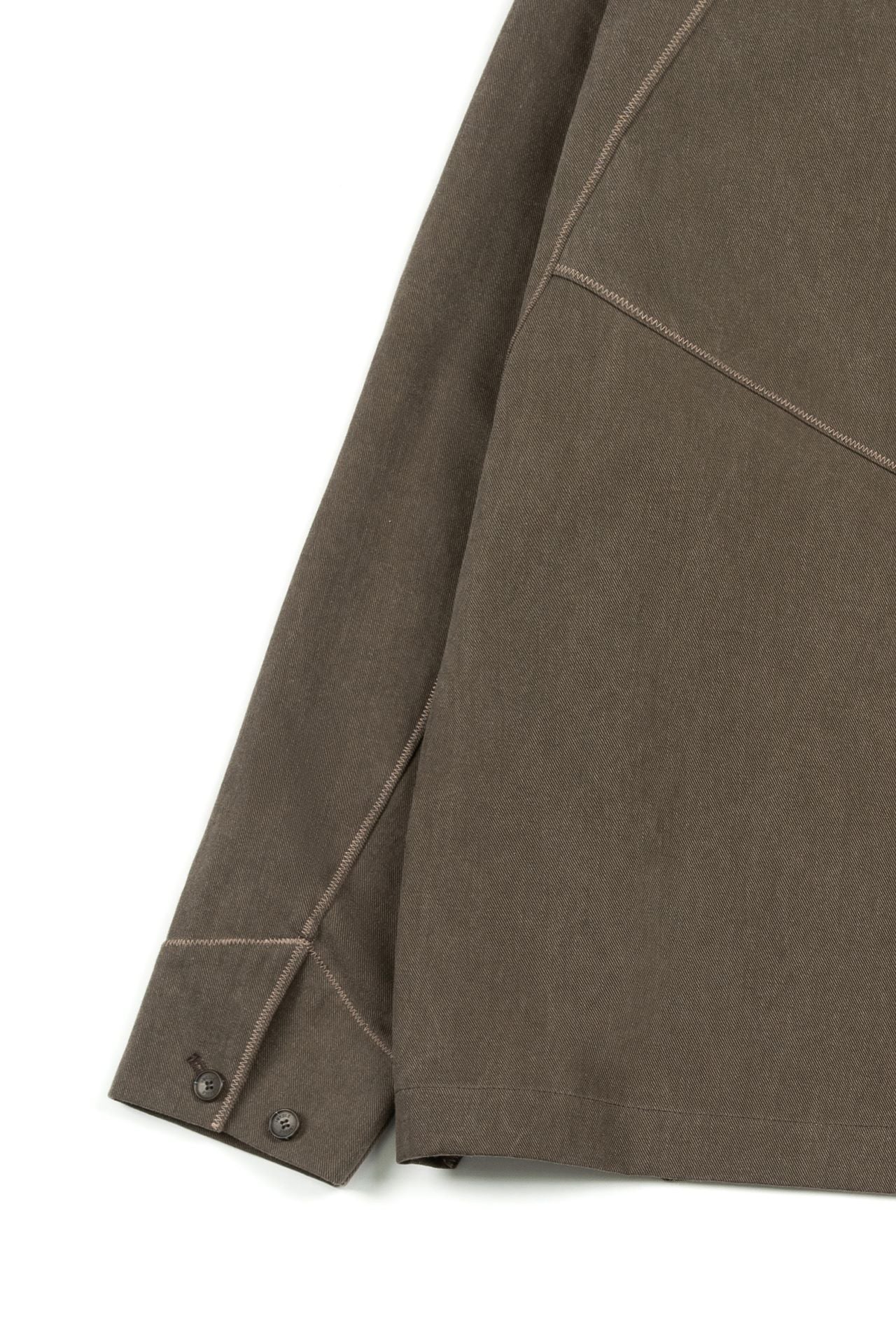 Brown diagonal landscape shirt by IOEDLE featuring a stylish geometric pattern, displayed flat with visible collar and button details.