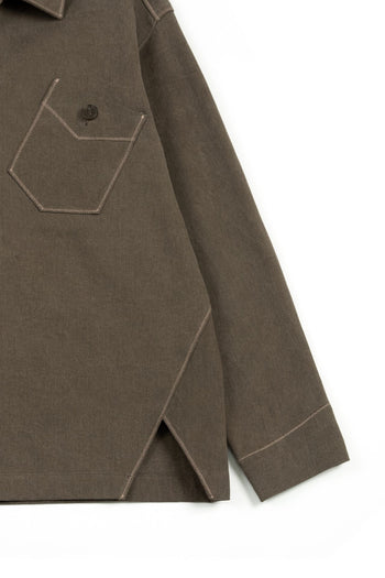 Brown IOEDLE diagonal landscape shirt displayed on a hanger, showcasing its stylish pattern and casual fit.
