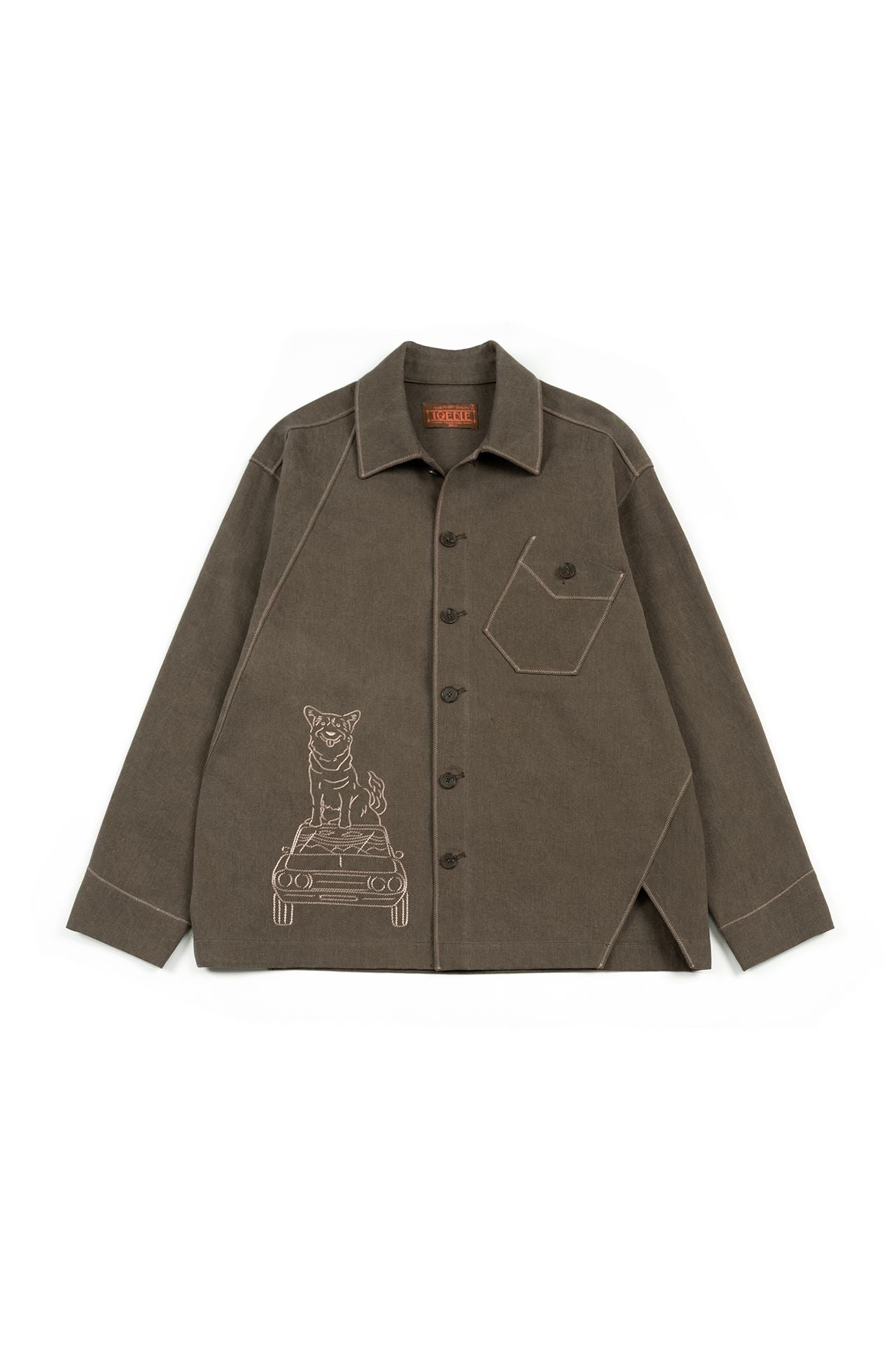 Brown IOEDLE diagonal landscape shirt featuring a geometric pattern, shown on a hanger against a plain background.