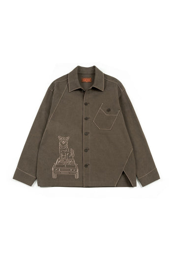 Brown IOEDLE diagonal landscape shirt featuring a geometric pattern, shown on a hanger against a plain background.
