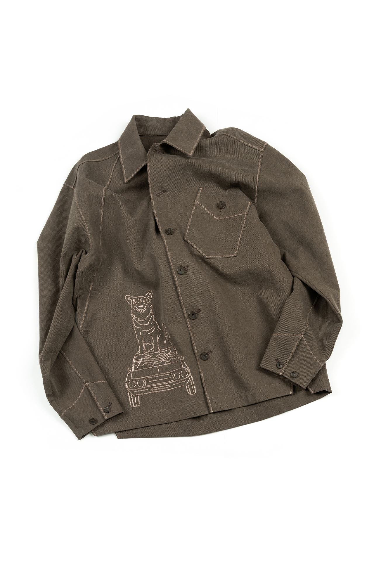 Brown IOEDLE diagonal landscape shirt displayed flat with a diagonal landscape pattern on the fabric.