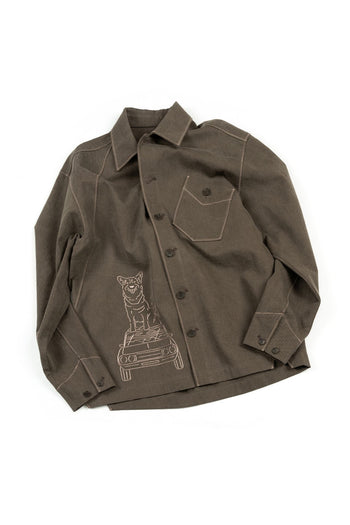 Brown IOEDLE diagonal landscape shirt displayed flat with a diagonal landscape pattern on the fabric.
