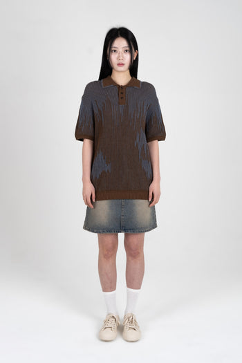 IOEDLE Meteor Shower Knit Brown shirt, close-up of soft brown fabric with textured knit pattern.