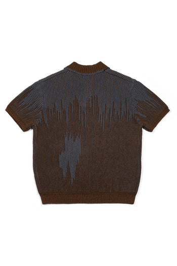 IOEDLE Meteor Shower Knit Brown shirt displayed flat, showcasing its brown color and textured knit fabric.