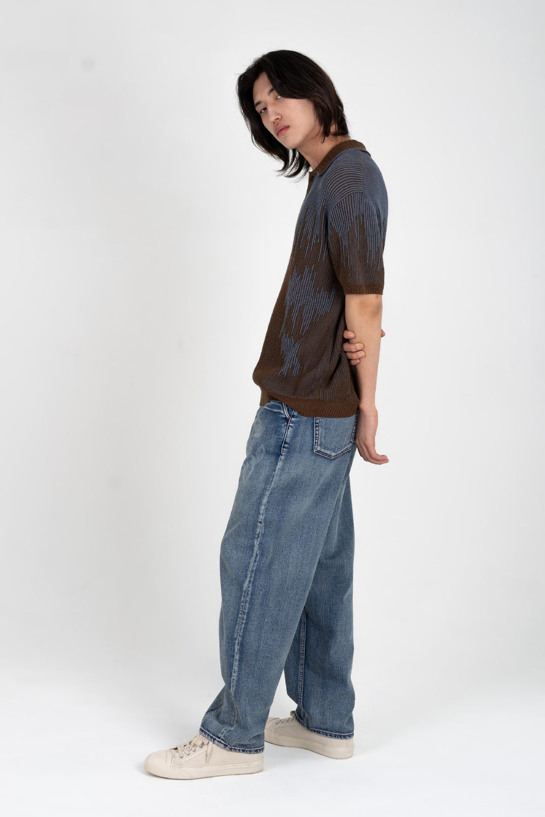 Brown Meteor Shower Knit shirt by IOEDLE, showing the soft fabric and casual fit in a close-up view.