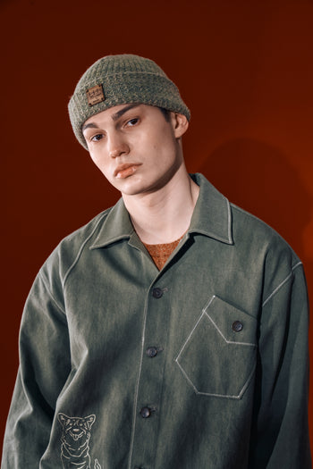 Green diagonal landscape shirt by IOEDLE featuring a vibrant, nature-inspired pattern on a casual shirt.