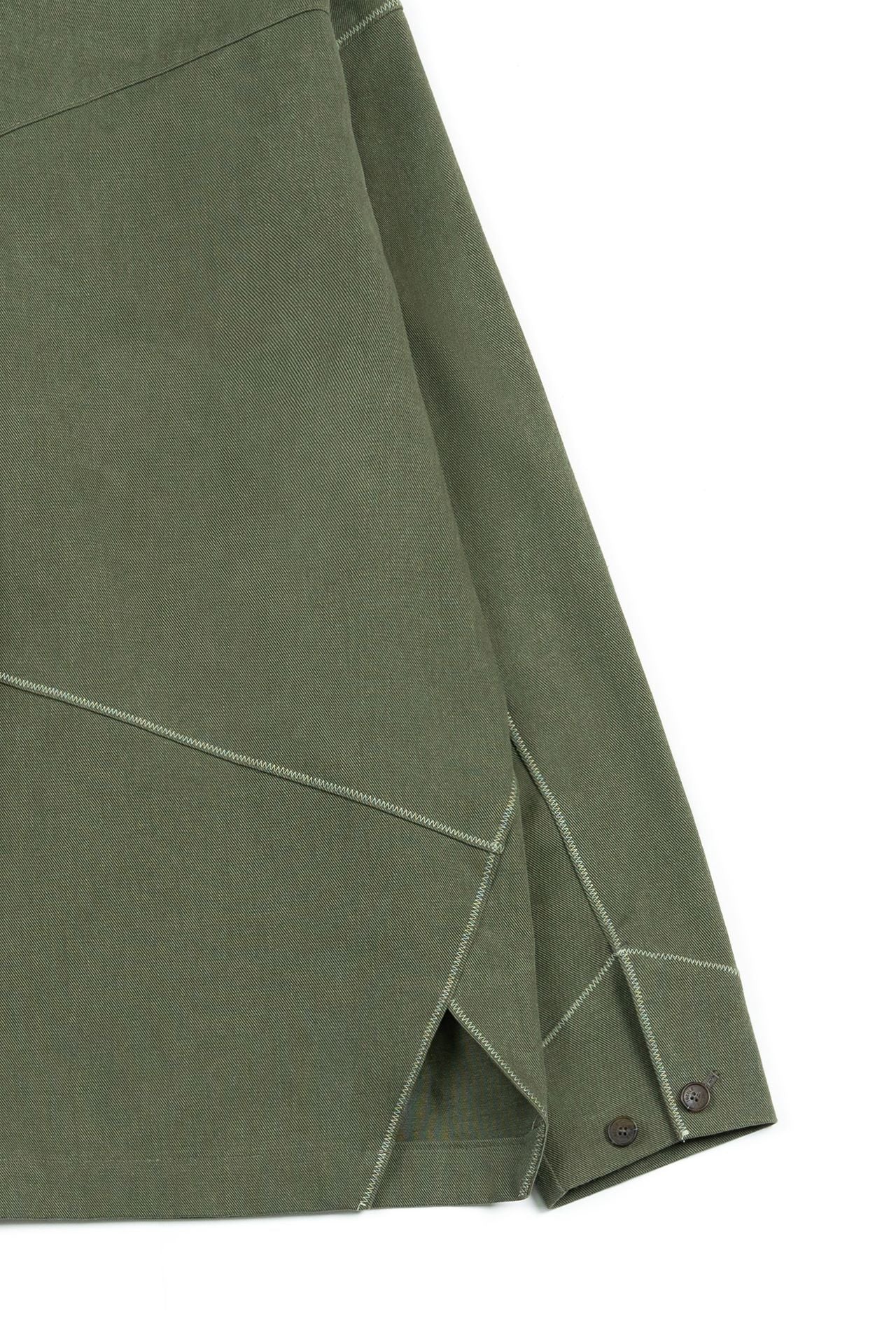 Green diagonal landscape shirt by IOEDLE, showcasing a stylish geometric pattern on the front fabric.
