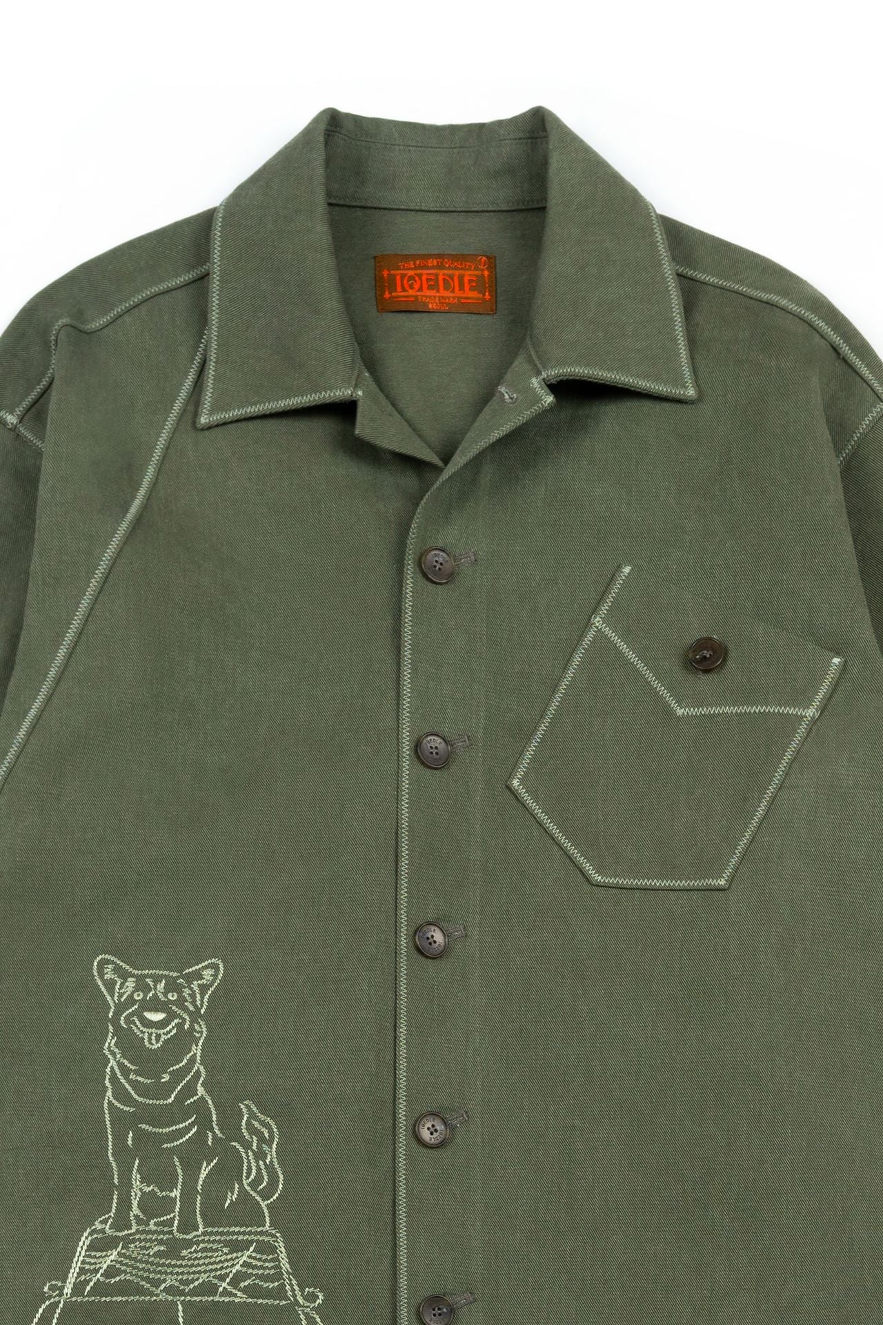 Green diagonal landscape shirt by IOEDLE, featuring a stylish geometric pattern on the front and a classic shirt design.