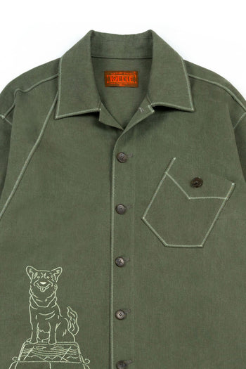 Green diagonal landscape shirt by IOEDLE, featuring a stylish geometric pattern on the front and a classic shirt design.