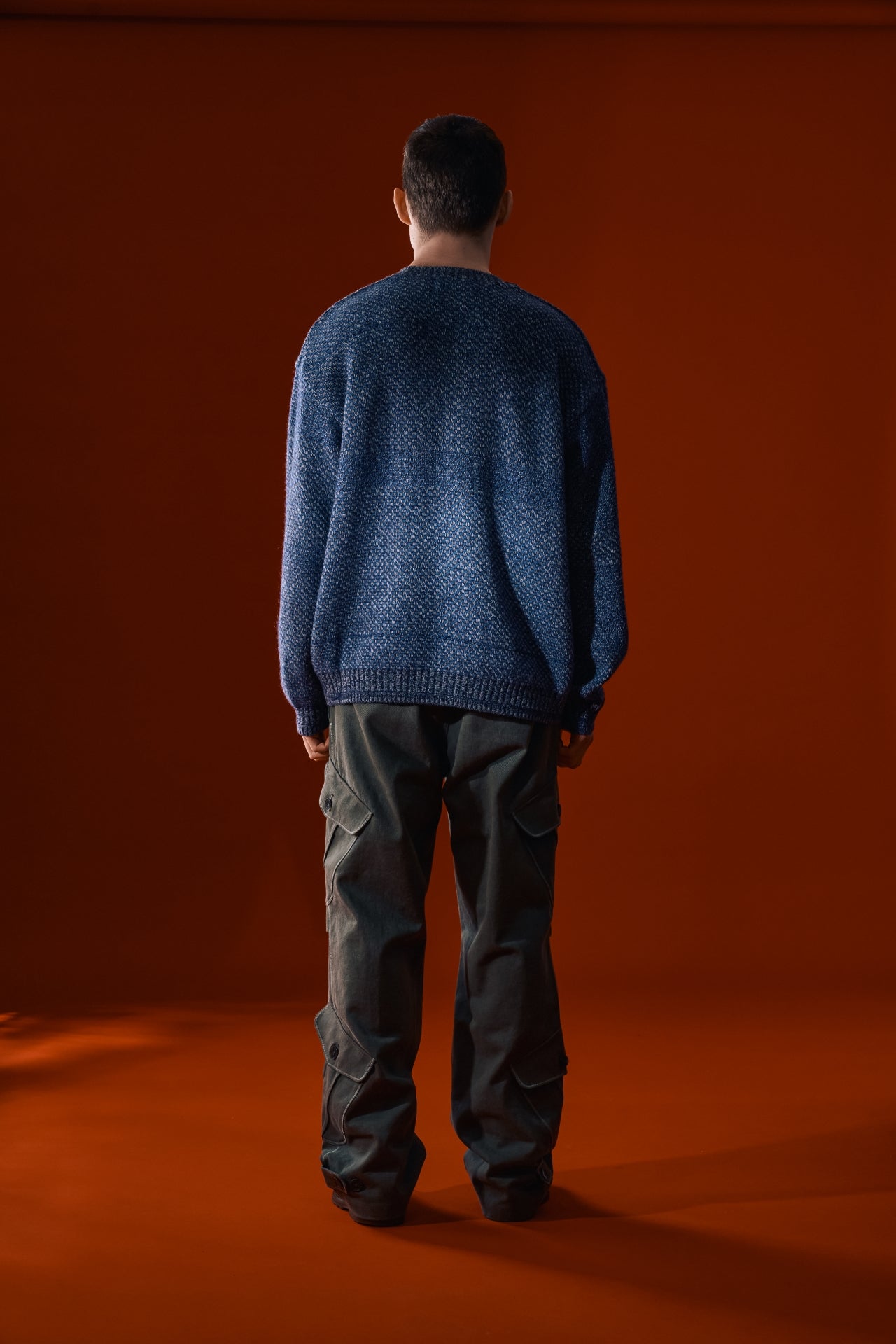 Navy IOEDLE House of Cars sweater featuring a cozy knit design, perfect for casual wear.