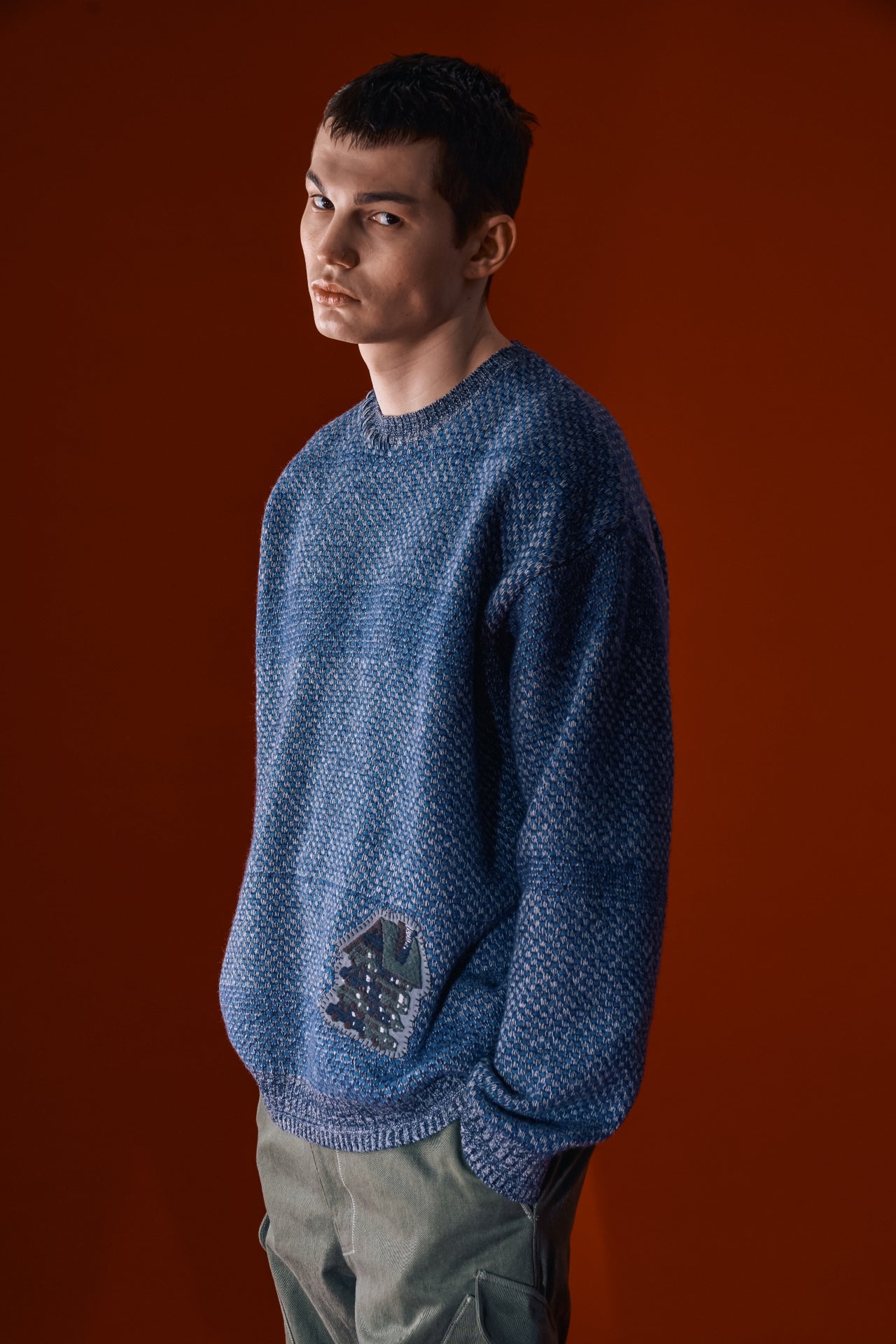 Navy House of Cars sweater by IOEDLE featuring a cozy knit design and a printed car-themed graphic on the front.