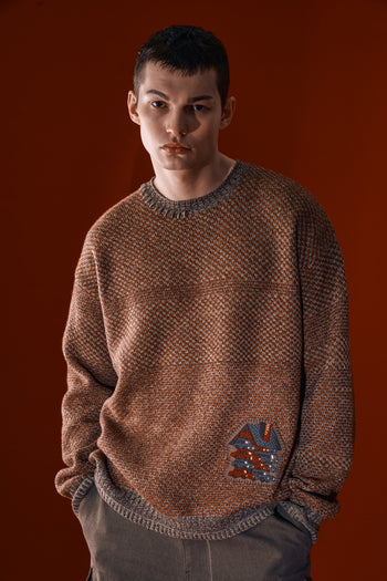 Red and brown House of Cars sweater by IOEDLE, featuring a stylish design and cozy knit fabric.