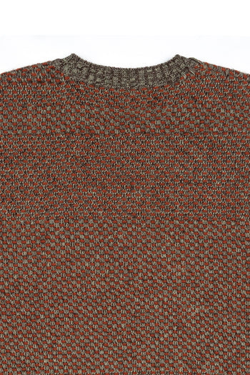 Red and brown IOEDLE House of Cars sweater, cozy knit sweater with car-themed design, front view in natural lighting.