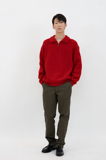 Red Concrete Jungle Sweater sweatshirt by IOEDLE, featuring a bold jungle print and comfortable fit.